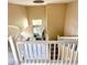 Elegant foyer with a decorative light fixture and a white tiled floor at 9792 Cordova Vista Ct, Las Vegas, NV 89183