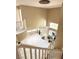 Elegant foyer with a decorative light fixture and a white tiled floor at 9792 Cordova Vista Ct, Las Vegas, NV 89183