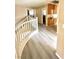 Hallway with wood floors and cabinets at 9792 Cordova Vista Ct, Las Vegas, NV 89183