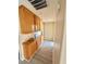 Hallway with built-in storage and wood flooring at 9792 Cordova Vista Ct, Las Vegas, NV 89183