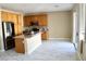 Bright kitchen featuring stainless steel appliances, granite countertops, and tile flooring at 9792 Cordova Vista Ct, Las Vegas, NV 89183