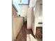 Narrow side yard with retaining wall and fencing at 9792 Cordova Vista Ct, Las Vegas, NV 89183