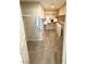 Spacious walk-in closet with built-in shelving, rod, and plush carpeting at 9792 Cordova Vista Ct, Las Vegas, NV 89183
