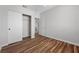 Bedroom features wood floors and a walk-in closet at 9901 Trailwood Dr # 2144, Las Vegas, NV 89134