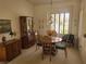 Charming dining room featuring a classic china cabinet and traditional decor at 9937 Villa Ridge Dr, Las Vegas, NV 89134
