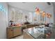 Modern bar area with granite countertops, custom cabinetry, and ample lighting at 10 Innisbrook Ave, Las Vegas, NV 89113