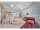 Luxurious bathroom featuring a sunken tub with decorative glass block and ambient lighting at 10 Innisbrook Ave, Las Vegas, NV 89113
