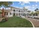 Expansive backyard with lush turf, mature trees, and exquisite landscaping at 10 Innisbrook Ave, Las Vegas, NV 89113