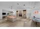Spacious game room with a pool table, fireplace, and comfortable seating area at 10 Innisbrook Ave, Las Vegas, NV 89113