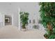 Upstairs hallway with plants, high ceilings and an overlook of the foyer below at 10 Innisbrook Ave, Las Vegas, NV 89113