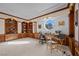 Well-lit home office featuring custom built-in shelving, and neutral carpeting at 10 Innisbrook Ave, Las Vegas, NV 89113