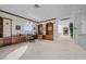 Well-lit home office featuring custom built-in shelving, and neutral carpeting at 10 Innisbrook Ave, Las Vegas, NV 89113