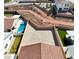 Aerial shot of yards highlighting landscaping, pool, and walking trail access at 10239 Meandering Dell Ave, Las Vegas, NV 89166