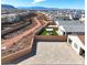 This aerial view shows a blank backyard canvas with neighborhood mountain views at 10239 Meandering Dell Ave, Las Vegas, NV 89166
