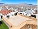 This spacious backyard features desert landscaping, brick privacy walls and neighborhood views at 10239 Meandering Dell Ave, Las Vegas, NV 89166