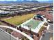 Community park featuring a green space, basketball court and a picnic area, with mountain views in the background at 10239 Meandering Dell Ave, Las Vegas, NV 89166