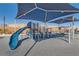 A shaded community playground for residents to enjoy at 10239 Meandering Dell Ave, Las Vegas, NV 89166