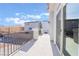 Spacious balcony with iron railing, offering neighborhood views at 10319 Santero Bay Ct, Las Vegas, NV 89141