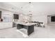 Modern kitchen with stainless steel appliances and spacious center island at 10319 Santero Bay Ct, Las Vegas, NV 89141
