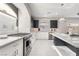 Kitchen features stainless steel appliances and white countertops at 10319 Santero Bay Ct, Las Vegas, NV 89141