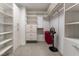 Well-organized walk-in closet with ample shelving and hanging space at 10319 Santero Bay Ct, Las Vegas, NV 89141