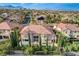 Aerial view of home with mountain views, desert landscaping, and a well-maintained neighborhood at 10671 Capesthorne Way, Las Vegas, NV 89135