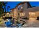 Luxury backyard featuring outdoor lounge furniture and a swimming pool at 10671 Capesthorne Way, Las Vegas, NV 89135