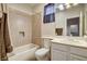Well-maintained bathroom featuring a tub-shower, and an expansive countertop at 10671 Capesthorne Way, Las Vegas, NV 89135