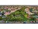 Aerial view of the lush community highlighting a park with mature trees at 10671 Capesthorne Way, Las Vegas, NV 89135