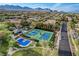 Community park features tennis and basketball courts with walking paths and a playground at 10671 Capesthorne Way, Las Vegas, NV 89135