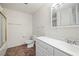 Bright bathroom featuring a shower over bath and a single sink vanity at 1160 Huracan St, Pahrump, NV 89048