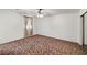 A large bedroom with carpeting throughout at 1160 Huracan St, Pahrump, NV 89048