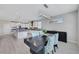 Contemporary dining area with stylish chairs, modern light fixture, and lots of natural light at 1609 Dream Canyon Ave, North Las Vegas, NV 89084
