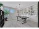 Spacious home office with custom built-ins, a modern desk, and contemporary lighting at 1609 Dream Canyon Ave, North Las Vegas, NV 89084