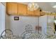 Charming breakfast nook with a decorative chandelier and a glass table at 2037 Poppywood Ave, Henderson, NV 89012