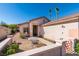 Inviting courtyard entrance with a small table and chairs offering a cozy outdoor space at 2037 Poppywood Ave, Henderson, NV 89012