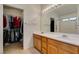 Bright bathroom with dual sinks and ample closet space at 2037 Poppywood Ave, Henderson, NV 89012