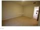 Neutral carpeted bedroom with a doorway leading to the rest of the house at 2324 Orangeburg Pl, Henderson, NV 89044