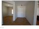 A bright entryway with double doors, a pendant light, and access to other rooms at 2324 Orangeburg Pl, Henderson, NV 89044