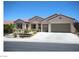 Charming single story home featuring a three car garage and drought resistant landscaping at 2324 Orangeburg Pl, Henderson, NV 89044
