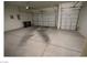 Spacious three car garage with ample room for vehicles and storage at 2324 Orangeburg Pl, Henderson, NV 89044