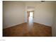 Hallway featuring tile flooring and a view into the open living space at 2324 Orangeburg Pl, Henderson, NV 89044