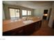 Kitchen counter and cabinets with a view into the dining area at 2324 Orangeburg Pl, Henderson, NV 89044
