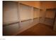 Walk-in closet featuring built-in shelving at 2324 Orangeburg Pl, Henderson, NV 89044