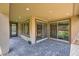 Covered patio space with brick flooring and recessed lighting at 243 Sun Glaze Ave, Henderson, NV 89011