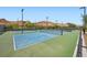 Well-maintained tennis courts with mountain views, offering a scenic and active lifestyle at 243 Sun Glaze Ave, Henderson, NV 89011