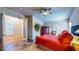 Relaxing bedroom featuring a comfortable bed and an open door to another room at 25 Luce Del Sole # 3, Henderson, NV 89011