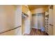 Organized walk-in closet with custom shelving and drawers, offering ample storage space at 25 Luce Del Sole # 3, Henderson, NV 89011