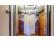 Interior view of the elevator in the building featuring stainless steel doors and a tile floor at 25 Luce Del Sole # 3, Henderson, NV 89011