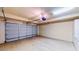 Spacious two-car garage featuring epoxy floor and ample storage space at 25 Luce Del Sole # 3, Henderson, NV 89011